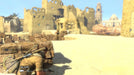In-game screenshot from Sniper Elite 3 Season Pass, showing the player character taking cover in North African ruins. Purchase your Steam game key at RushGame.co for immediate digital delivery
