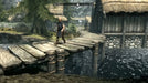 Riverwood village scene from Skyrim Anniversary Edition Steam Key, showcasing the detailed environments players can explore, available at RushGame.co