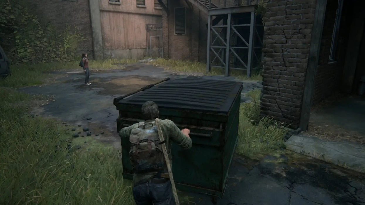 The Last of Us Part I gameplay – environmental puzzle – Joel pushes a large dumpster to access a blocked area, showcasing interactive exploration in The Last of Us Part I Steam Key. Get your copy at RushGame.co.